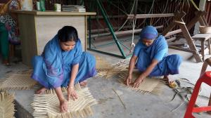Our mothers are trained in livliehood making skills. Here are two making something from bamboo.