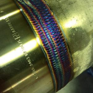 Professional inspector from AWSCWI.COM in the process of evaluating a welding project's quality and adherence to code compliance..