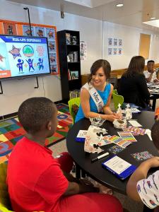 Miss Kentucky assisting with a Global Game Changers Lesson.