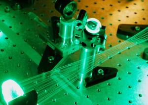 Green laser experiment on an optical table in a laser lab