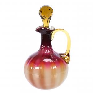 Plated amberina art glass cruet by New England Glass, 6 ¾ inches tall, with a perfect handle and a polished pontil base, from the collection of Frank and Melissa Keathley (est.$1,500-$3,000).