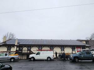 Virtue Solar technicians installing solar panels on Wakefield Country Day School in Huntly, VA