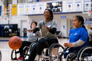 Athletes playing basketball; Ace of Hearts Project