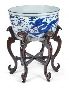 Monumental Chinese blue and white dragon basin with partial Jiajing mark (est. $4,000-$6,000).