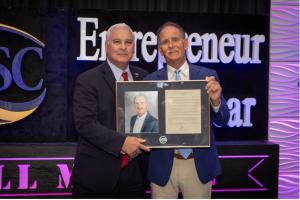 Indian River State College President Dr. Timothy Moore and Entrepreneur of the Year Award winner 2024 William “Bill” Marine (Photo Credit: Denise Ritchie)