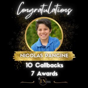 A celebratory graphic featuring Nicolas Pancine, with a beaming smile, encircled by a golden ring against a black background with sparkling gold dust. Text reads "Congratulations Nicolas Pancine - 10 Callbacks, 7 Awards" with The Industry Network logo at 
