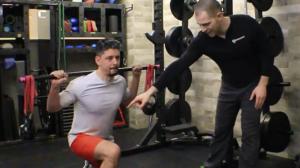 Dr. Brent Brookbush teaches a Transverse Plane Lunge with Unstable Loads