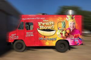 The bright red and yellow colors this food truck wrap blends the logo and colors in a most pleasing way.