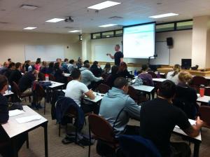 Image from a video lecture. Dr. Brent Brookbush teaching a group of students.