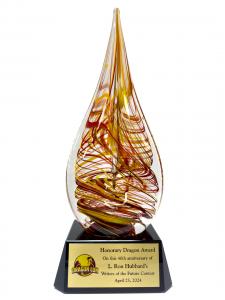 Honorary Dragon Award presented to Writers of the Future with inscription "Honorary Dragon Award on this 40th anniversary of  L. Ron Hubbard's Writers of the Future Contest. 25 April 2024