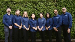 L to R  Alex Everett (OHT), Paras Paton (OHT), Hannah Robertson (OHT), Dr Brenda (principal dentist/director), Dr Eren Tuncer (dentist), Ashwani Lal (Dental Hygienist), Dr Shammi (principal dentist/director), Dr Gautam (principal dentist/director)