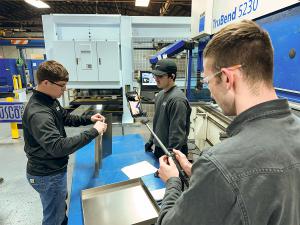 Employees demonstrating workforce development for a recent social media campaign for Tuscarawas County, Ohio youth