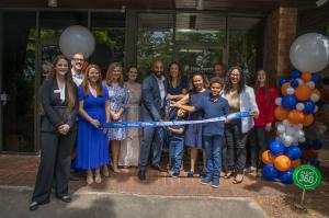 True North Restoration business owners and Cobb Chamber officials pose in front of True North's Marietta office.