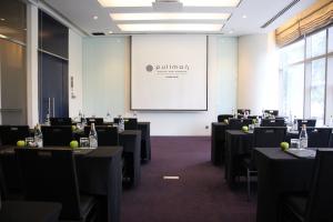 Meeting rooms at Pullman Saigon Centre with floor-to-ceiling windows.