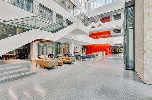 Terrazzo floor in lobby and cantilevered two-story staircase