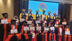 Group Photograph of Aslam Shems with Other Awardees of the Honorary Degree in Dubai