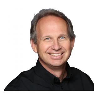 Color photo of author Mike Nager wearing black shirt