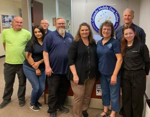 The Buzzkill Labs and Colorado Mobile Drug Testing teams pose for a photo