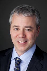 Head shot of a business man in suit