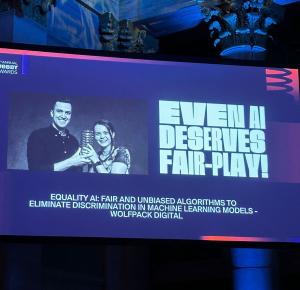 Wolfpack Digital's co-CEOs, Georgina Lupu Florian and Adrian Florian, with the Webby Award and their 5-word speech
