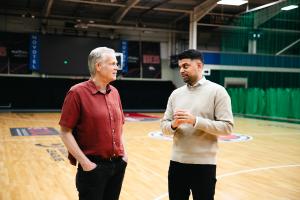Kevin Routledge, Chairman of Leicester Riders and Mattioli Arena, and Jas Hayer, Global Sales Director of Cyferd, speaking about AI in sports on the Leicester Riders court