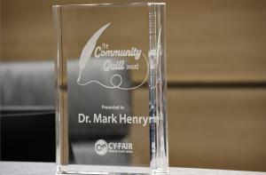 The prestigious inaugural Community Quill Award, created by Cy-Fair Federal Credit Union. The annual award recognizes individuals who have made sustained and exemplary contributions that improve the lives of those within the local community.