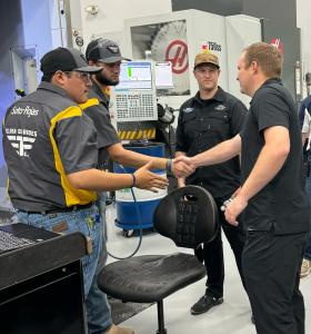 Preece & Custer Meeting Students Talking about precision manufacturing in the performance racing world.