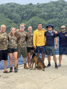Will Akerlof & Pete Bethune, Appa the Belgian Malinois, crew of the Modoc and members of the Costa Rican Coast Guard aboard the Modoc in Cocos Island, Costa Rica.