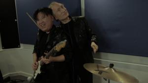 Kim and Putin being affectionate at band practice