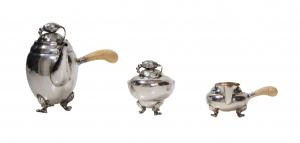 20th century Arts and Crafts sterling silver solitaire tea set by Georg Jensen and Wendelas (Denmark, #28) in the Jensen Blossom pattern (est. $2,500-$4,500).