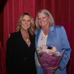 A photo of two powerhouse women in the spotlight: Aymie Majerski (left) celebrates with Doris Owens (right) after acquiring The Owens Group. Doris retires, entrusting her legacy to Aymie and LotusShark, marking the start of an exciting new chapter for bot