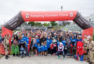 Walkers cheering at the start line of the 2024 Walk for Kids