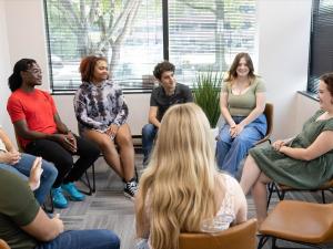 Young adults in a group therapy session at Sandstone Care Virginia Beach