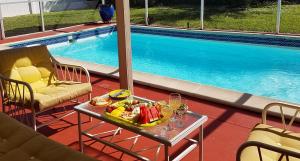 A private pool belonging to a house listed on People Like Us in Cape Coral FL, United States