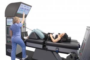 DRX9000 Lumbar Spinal Decompression Machine with Patient on It