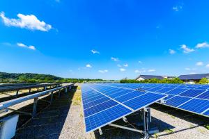 solar panels against a bright blue sky