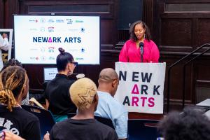 Newark Arts Executive Director Lauren LeBeaux Craig during her presentation during the Annual Newark Arts Meeting