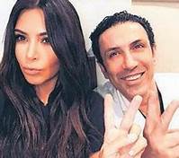 Kim Kardashian and Dr. Simon Ourian smiling in selfie