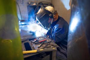 Sparks fly as one of the Maritime participants begins the project. The top prize was $10,000