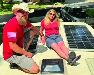 The Confers display their new RV solar panels