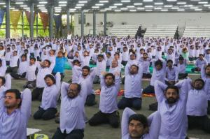Hari Krishna Exports team gathered to celebrate Yoga Day with enthusiasm, finding peace and wellness through yoga practices.