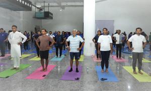Ghanshyam Dholakia with Mumbai team celebrating International Yoga Day 2024.