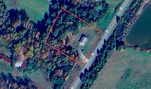 3 BR/1.5 BA home w/walk-out basement on 1± acre parcel.  This home measures 1,040± sf. above ground & 1,040± sf. in basement and features a large eat-in kitchen (appliances convey); family room; unfinished walk-out basement.