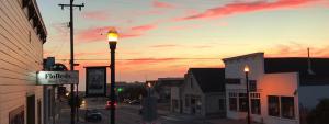 FloBeds Storefront with sun setting over Pacific Ocean