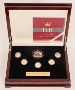 Elegant glossy finished wooden case containing five different portraits of Queen Elizabeth appearing on gold sovereign coins, all in brilliant uncirculated condition (3,012).