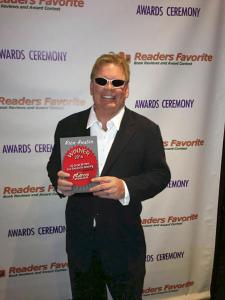 Photo of book author winning an award