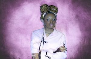  image features Seedel, a poet & mental health advocate,. Seedel radiates style and confidence alongside her contributions to literature & social causees