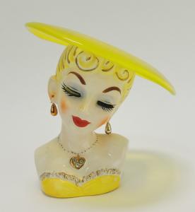 Napco lady head vase with glass hat, 6 inches tall. Estimate: $400-$600; minimum bid $1.