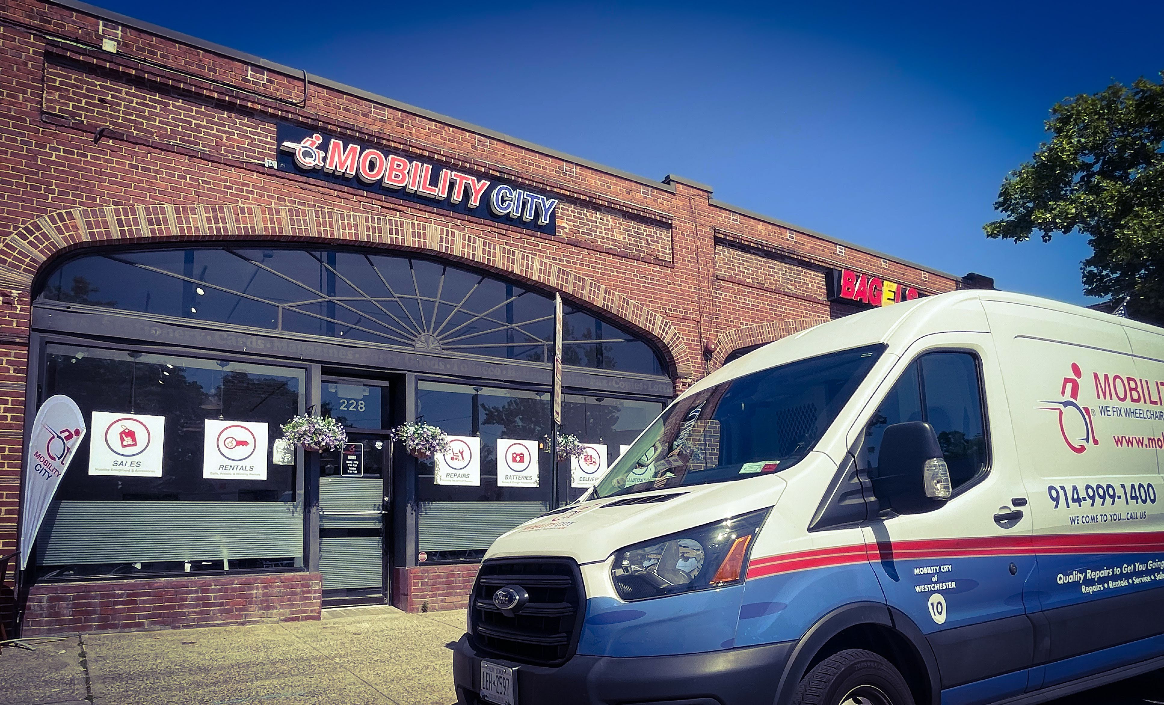 Photo of Mobility City of Westchester showroom frontage and Van, 228 E. Hartsdale Ave, Hartsdale, NY 10530,  914-999-1400