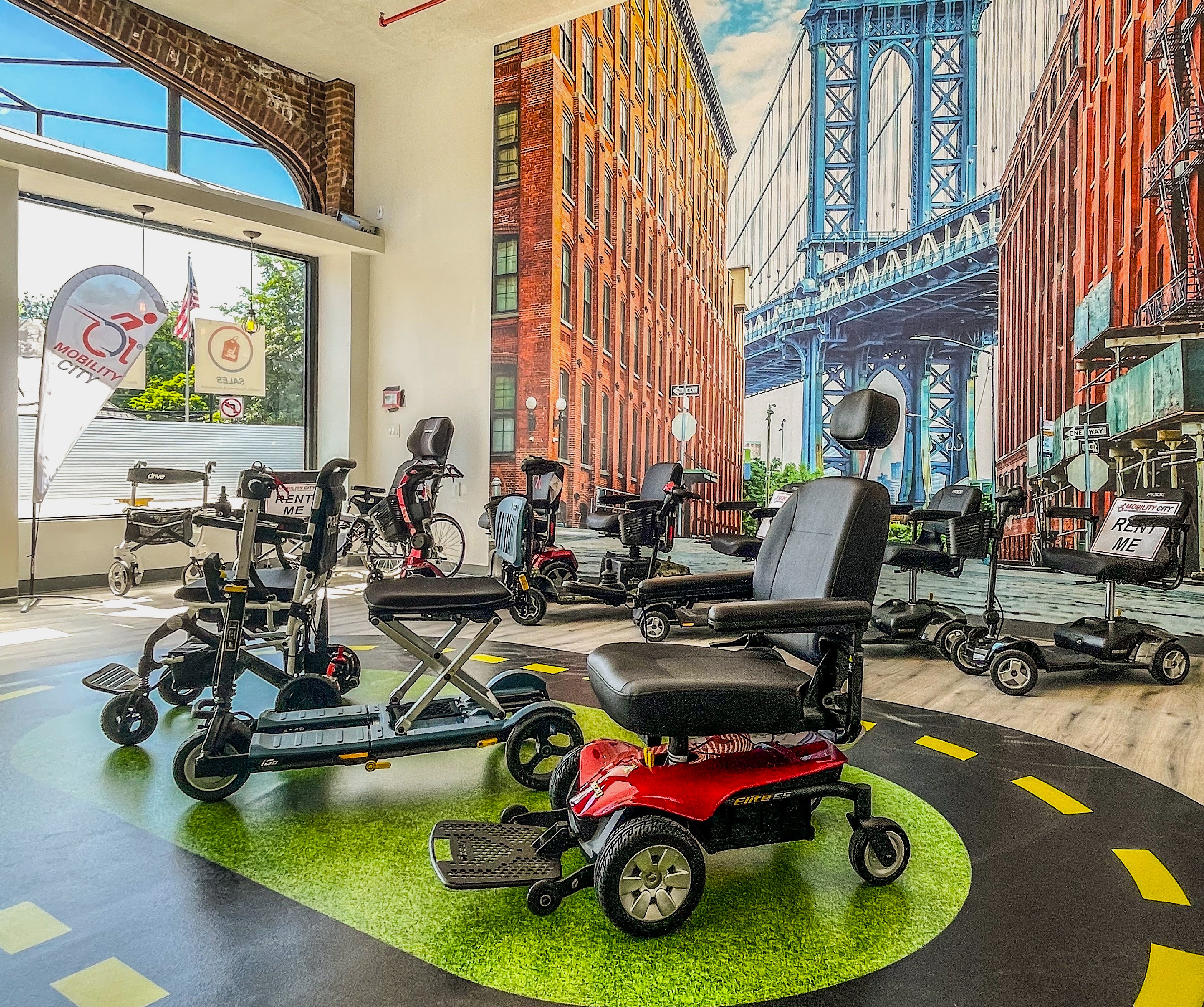 Photo of inside of the Showroom at Mobility City of Westchester County NY with power chairs, folding scooters, hospital beds, rollators, walking aids, and recliner lift chairs.